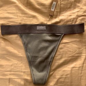 Skims Cotton Rib Thong in the color Pacific